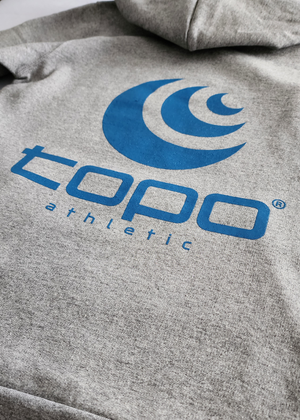Decorative Topo women's grey hoodie, showing light blue Topo logo on back of hoodie